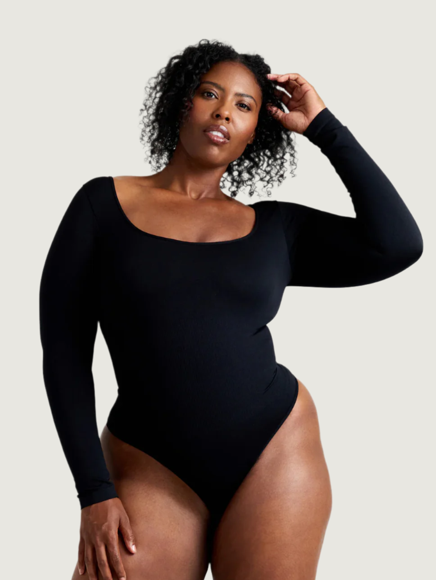 STRETCH LONG SLEEVE THONG BODYSUIT