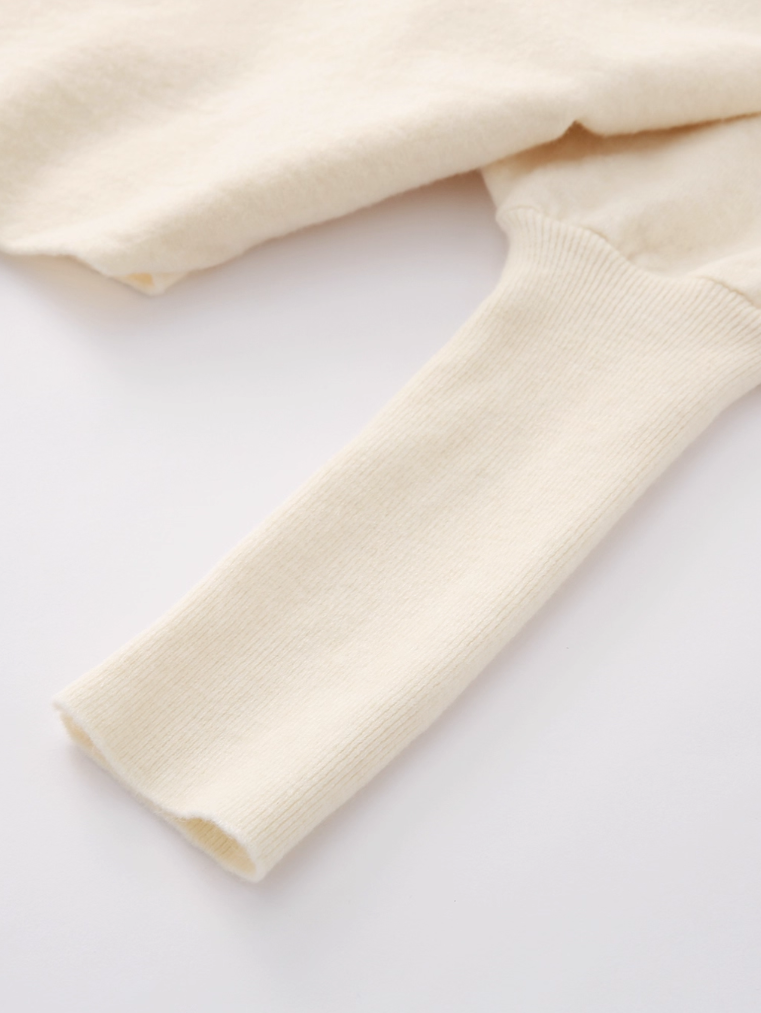 ASYMMETRIC BATWING KNIT SWEATER