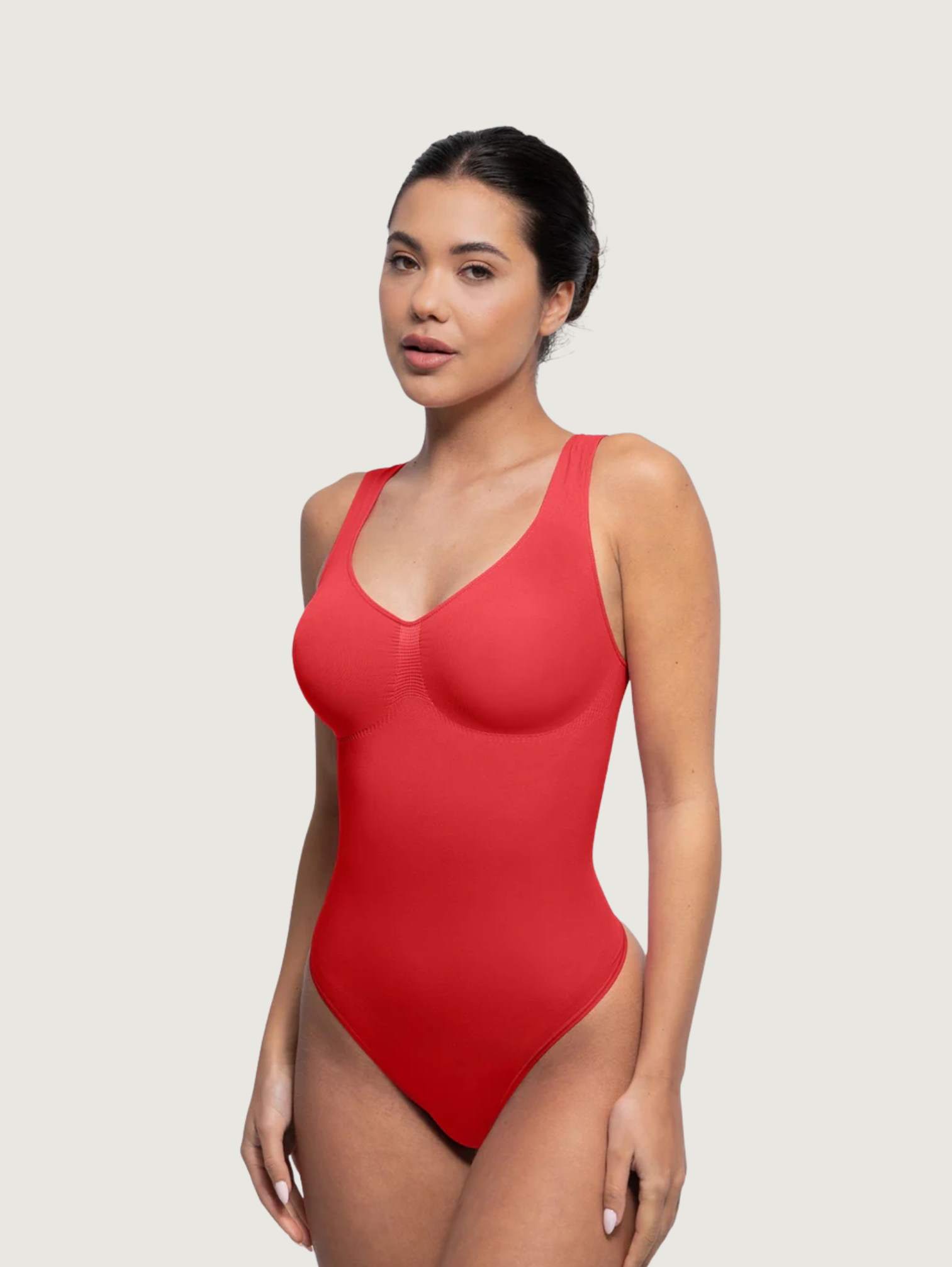 SCULPTING SEAMLESS THONG BODYSUIT